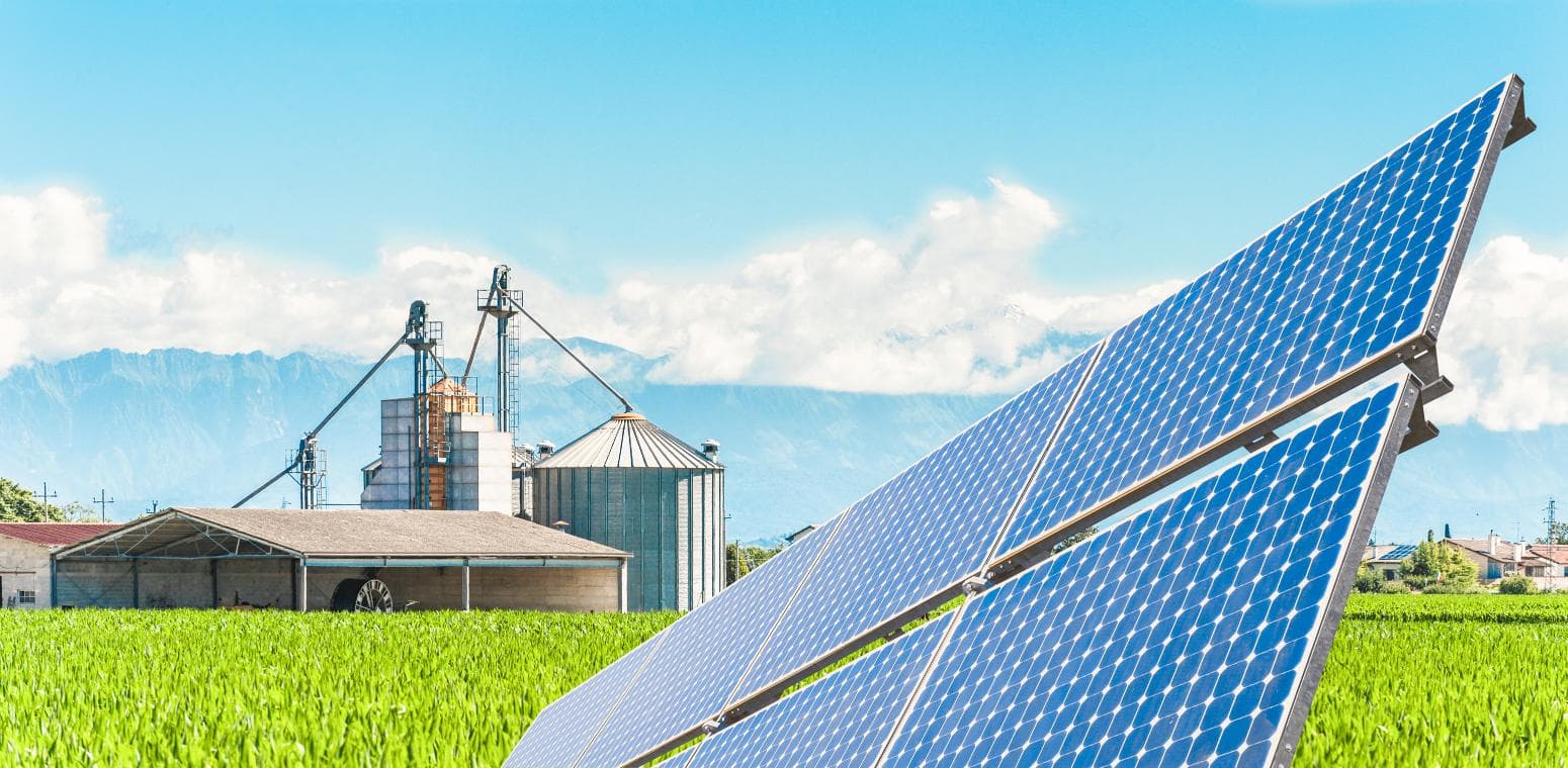 Solar panels against power plant